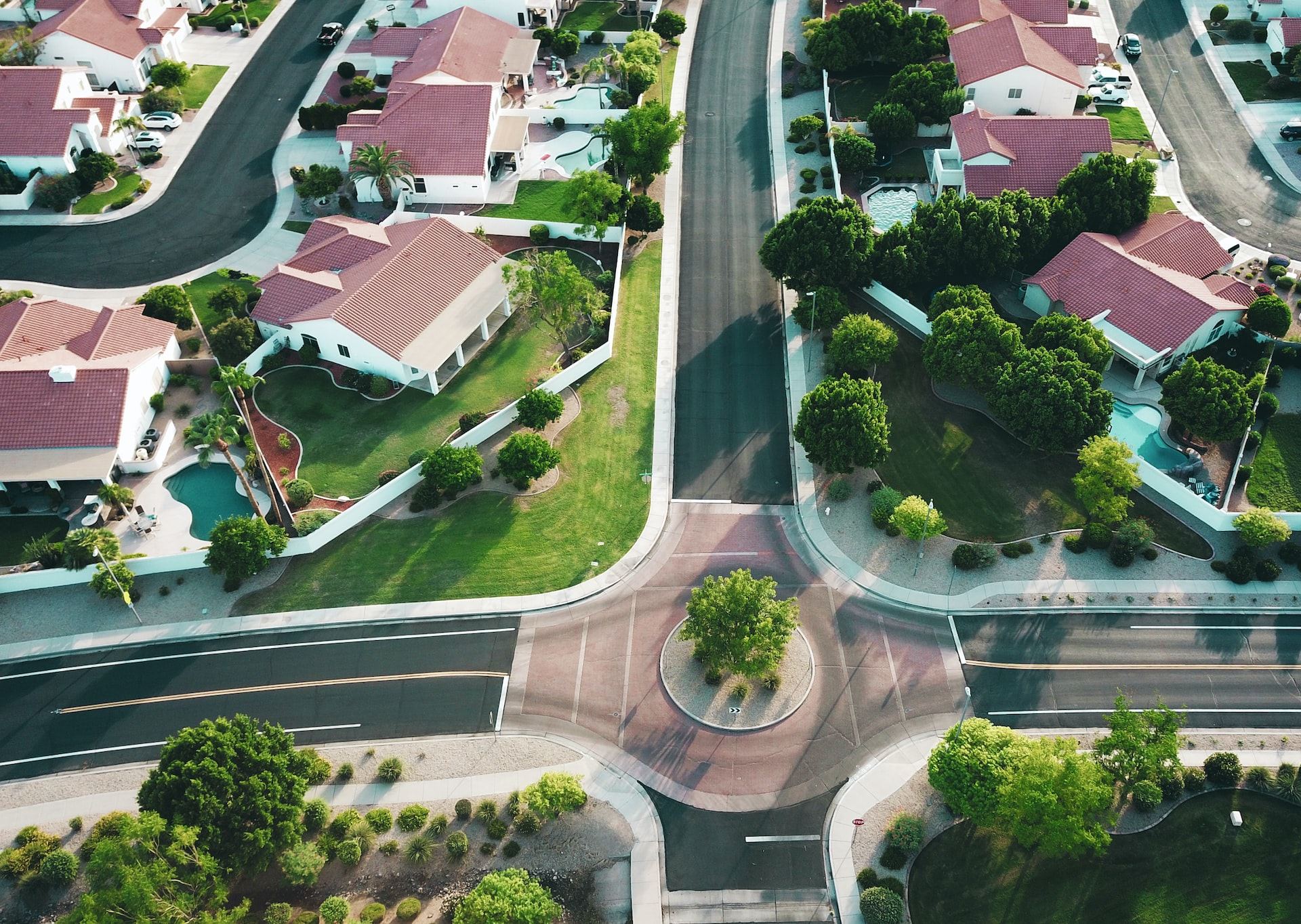 Desert neighborhood homes and yards from above